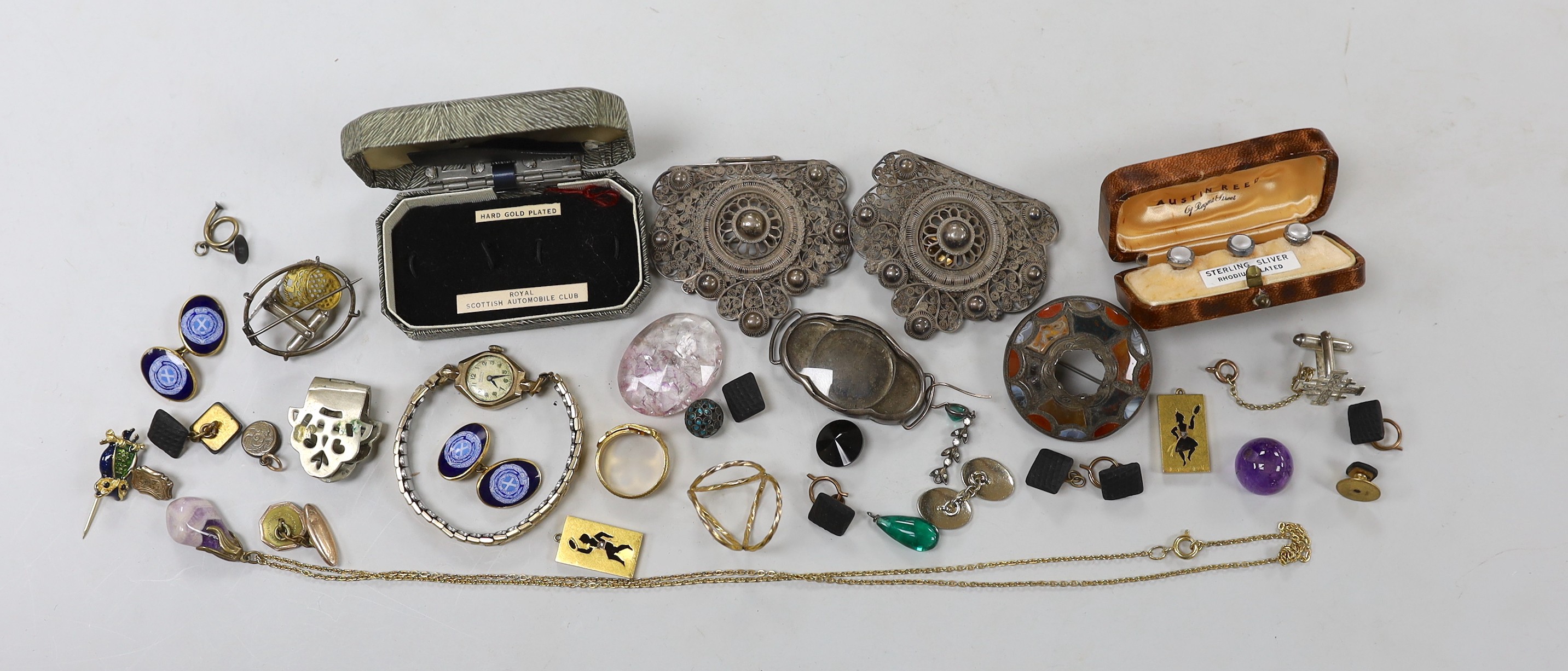 A pair of engraved 10ct oval cufflinks, 3.8 grams, two yellow metal and diamond chip set 'silhouette' charms and a quantity of sundry jewellery etc. including a lady's 9ct Buren wrist watch, Royal Scottish Automobile Clu